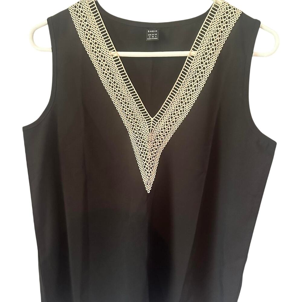 Elegant Black Sleeveless Blouse with Cream Lace